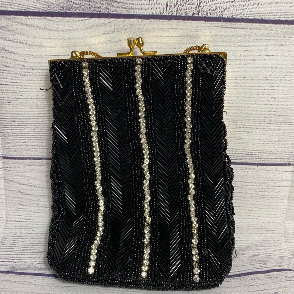 Black evening small purse.  Chain can be long or short